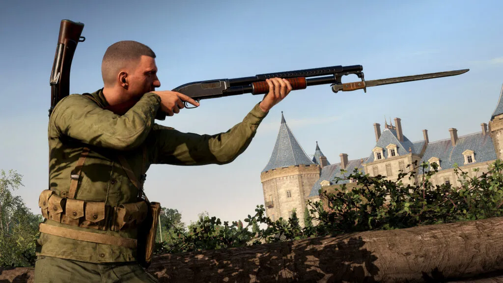 A soldier holds a trench gun with a bayonet attached.